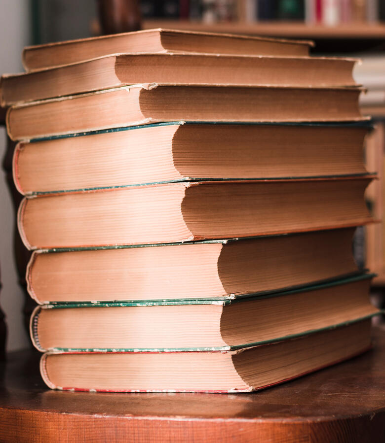 Untitled Stack of vintage books — browse the Wilding Within reading list